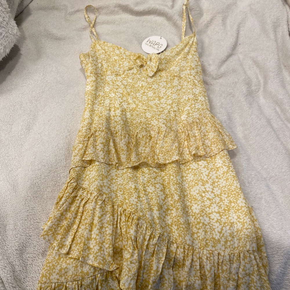 Yellow sun dress by “Wear all pretty girls”